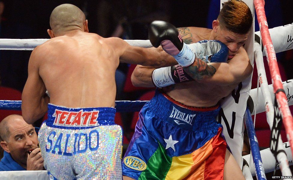 Orlando Cruz taking a punch