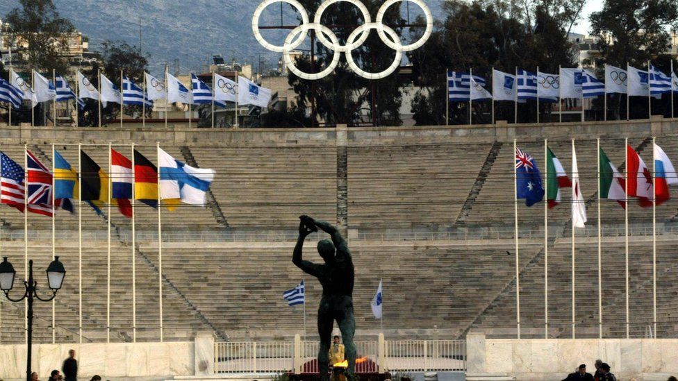 Greece Olympic image with rings and statue