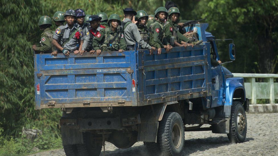 File image taken on 14 October 2016 shows armed military troops and police travelling in trucks through Rakhine State, Myanmar