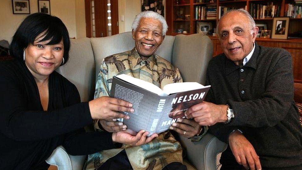2010 file picture of former South African President Nelson Mandela next to his daughter Zindzi (L) and fellow former political prisoner Ahmed Kathrada (R) in this handout photograph released by the Nelson Mandela Foundation