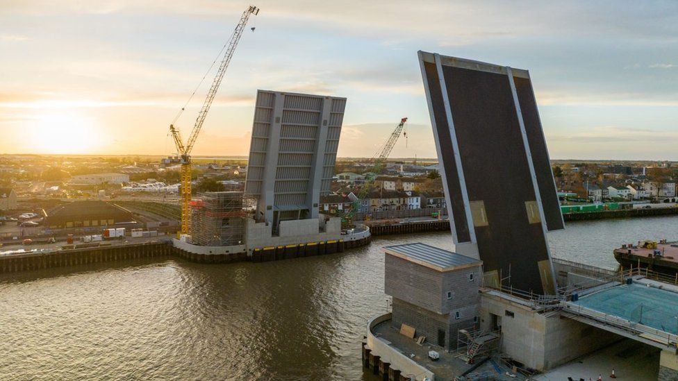 Herring bridge in the open position with ship moored alongside