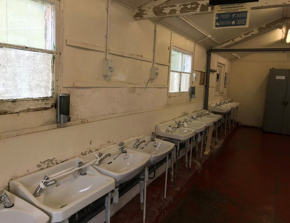 Wash room at Penally Camp