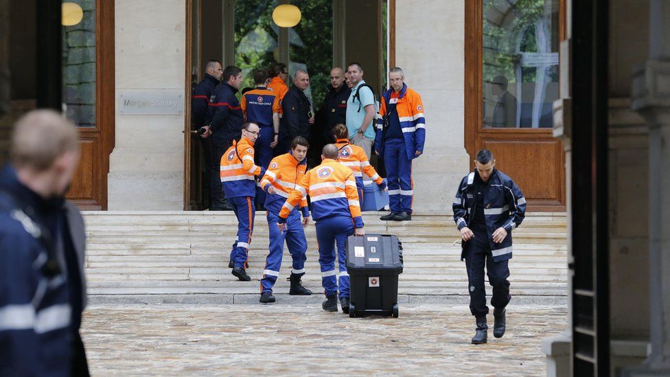 Emergency services work in a building near the Parc Monceau requisitioned to treat the injured (28 May)