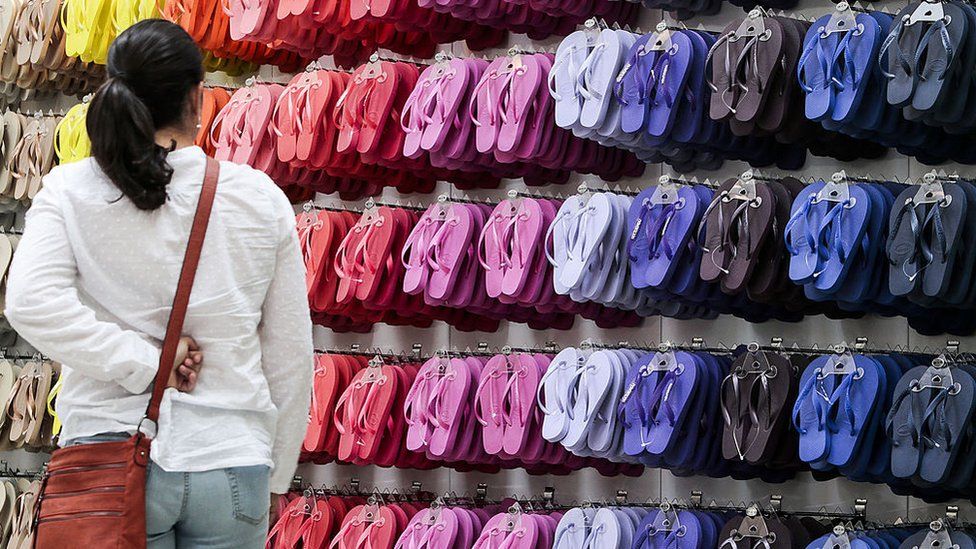 Havaianas, lined up in all colours of the rainbow