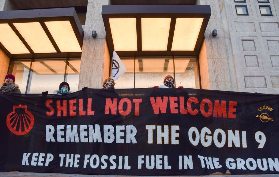 Protesters hold a 'Shell Not Welcome' banner referencing the Ogoni Nine, a group of nine Nigerian anti-Shell activists executed in 1995, during a London demonstration.