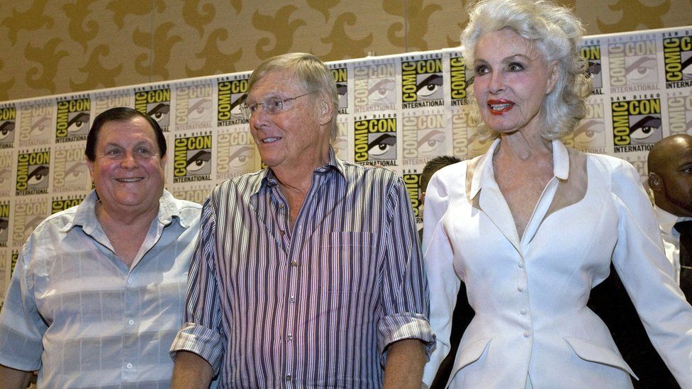 Original actors in the 1960s television series, Batman, (L-R) Burt Ward, Adam West, and Julie Newmar at Comic-Con 2014 in San Diego, California
