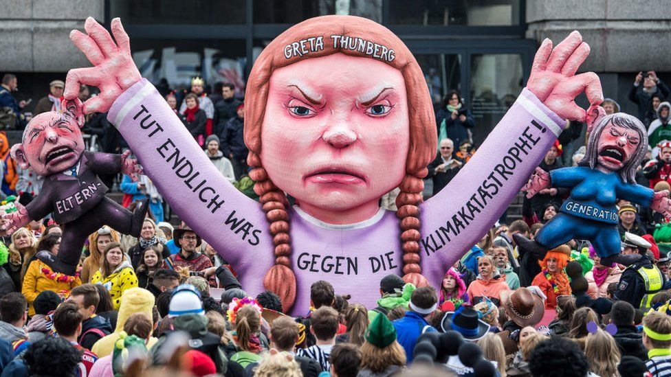 A float featuring an effigy of climate activist Greta Thunberg