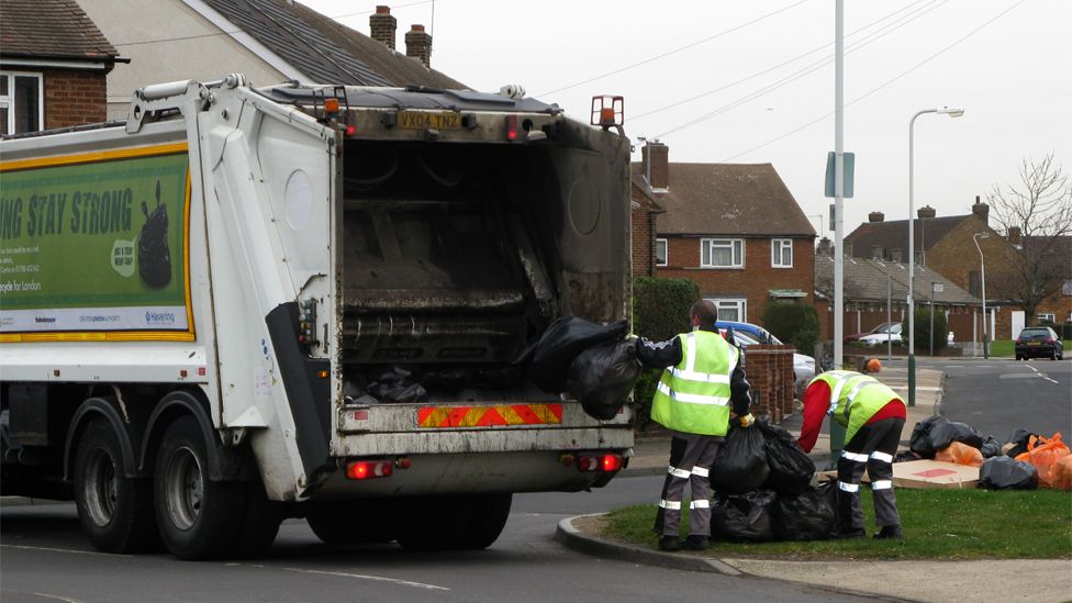 Bin men collecting rubbish in Rainham, Essex, in 2009