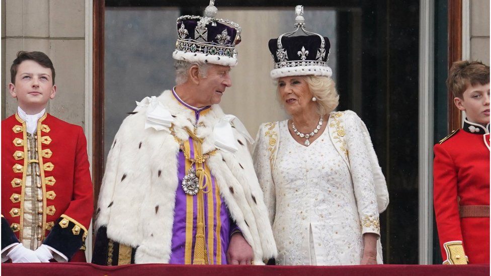 King Charles III and Queen Camilla on the balcony of Buckingham Palace, London, following the coronation