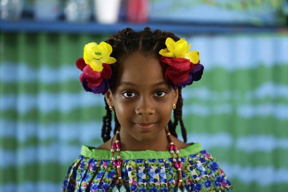People participate in the 5th annual Festival of the Pollera Congo, in the coastal town of Portobelo, Panama.