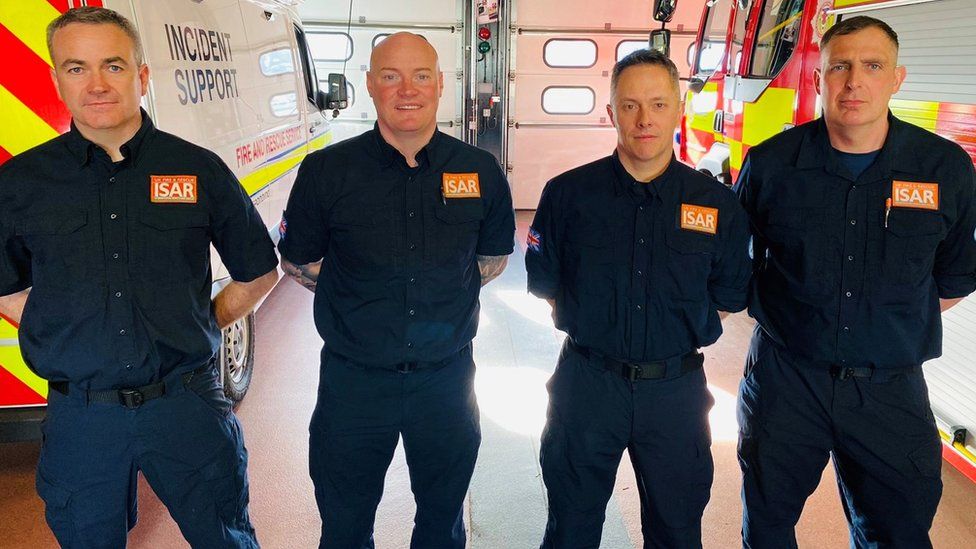 La squadra di soccorso a casa - l-r John Aitchison, Steven Adams, Keith Gauld e Tony Armstrong.