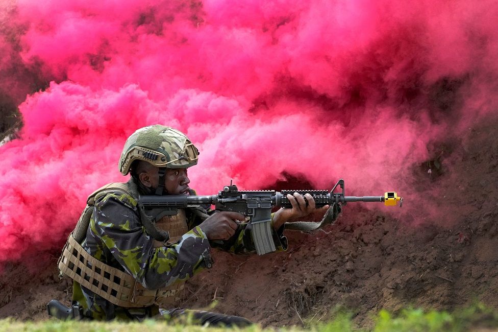 A soldier holds a rifle during a presentation at Mtongwe Naval Base in Mombasa.