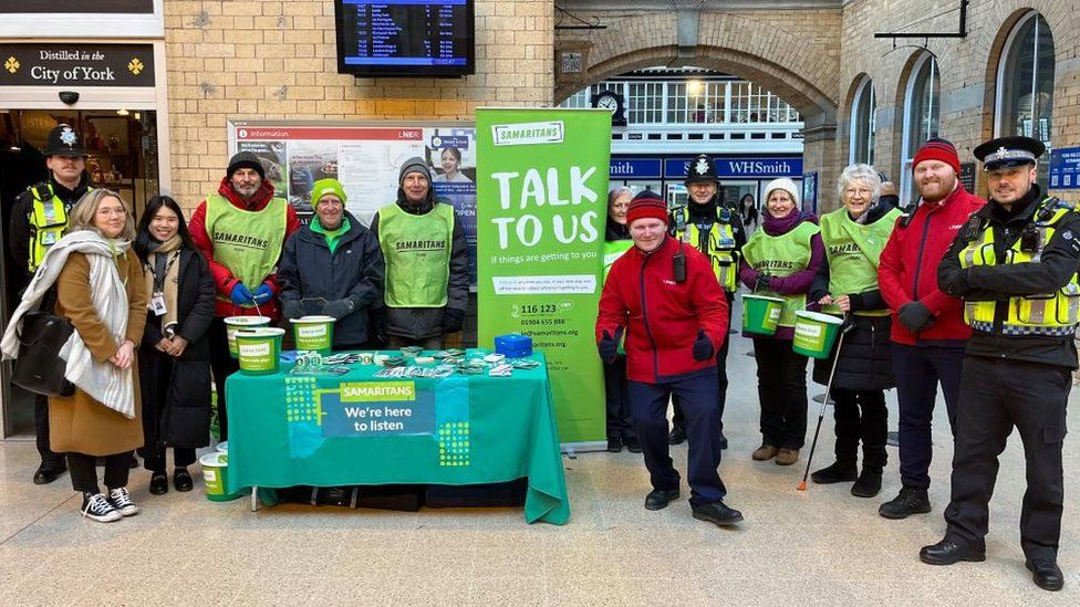 Samaritans volunteers with police and staff at York Station