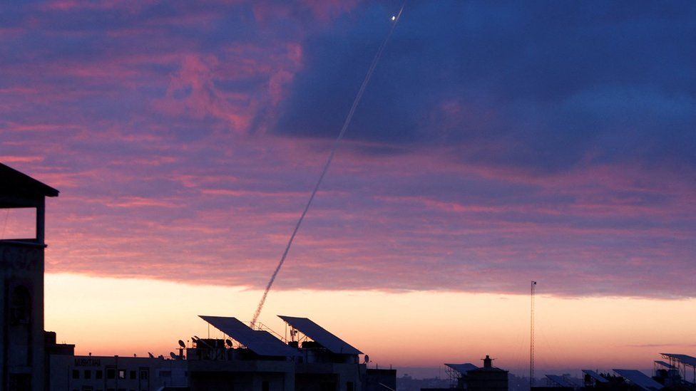 A trail of smoke is seen as rockets are fired from Gaza towards Israel on 23 February 2023