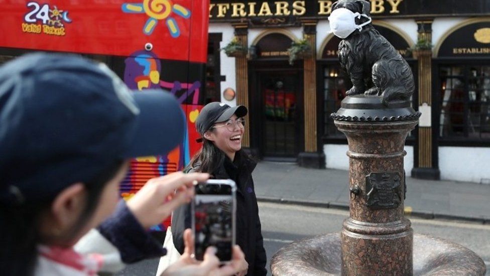 Tourists with Greyfriars Bobby