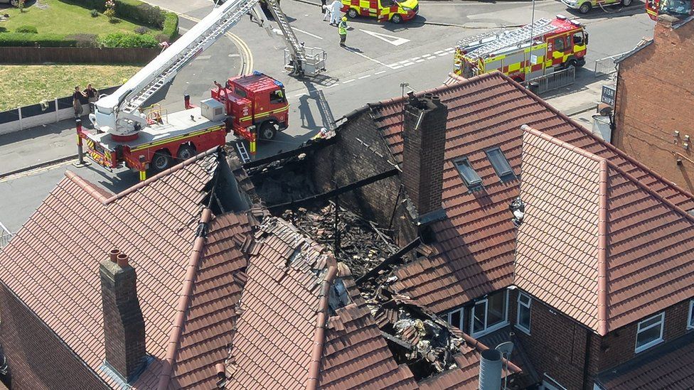 Homes evacuated as crews tackle Kitts Green shop fire - BBC News