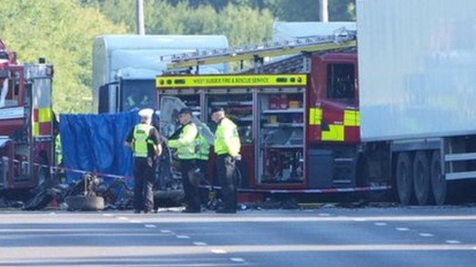 car and lorry collide on A23