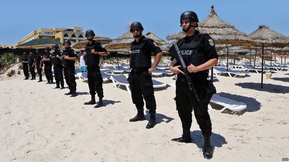 Tunisian security forces on the beach at Sousse, one week after deadly attack (3 July)