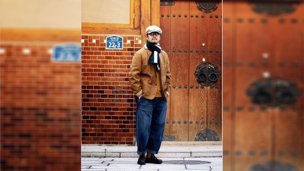 Model wearing Yarmouth Stores' engineer's jacket on the streets of Seoul in South Korea