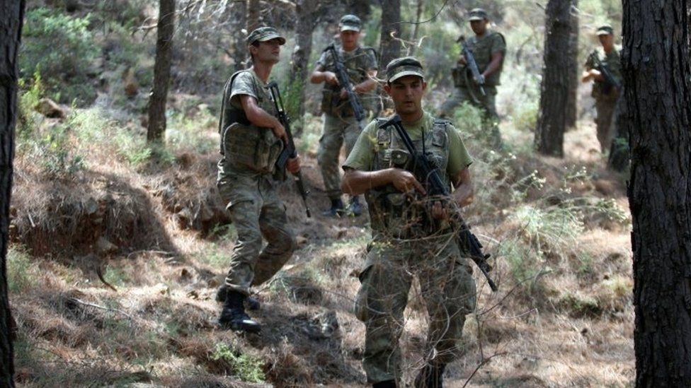 Soldiers searching woodland near Marmaris, Turkey