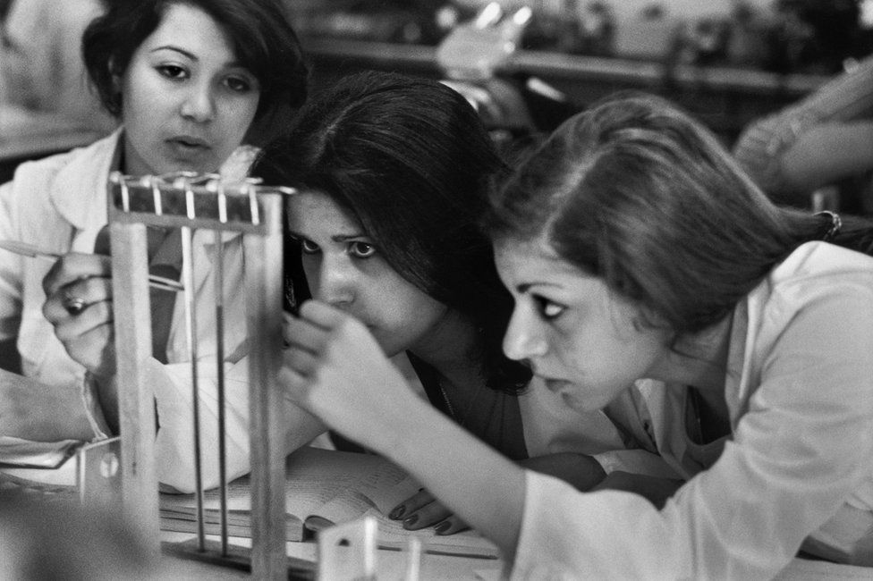Female students perform a test in the chemistry lab of Tehran University in 1977