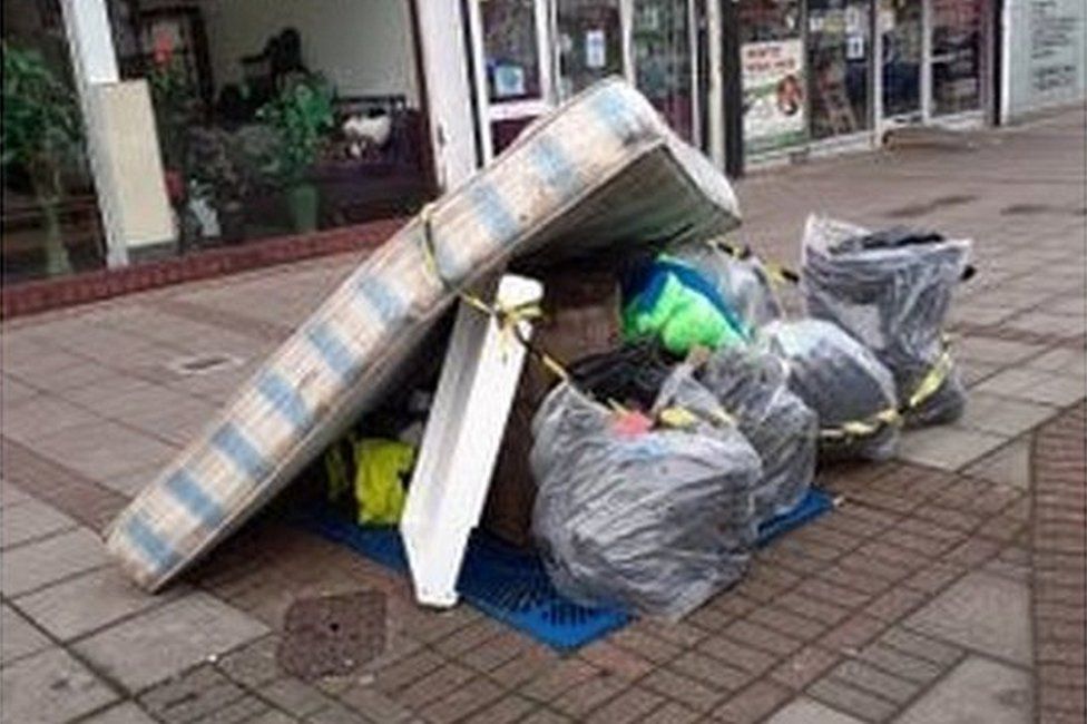 Pile of rubbish on street in Harrow