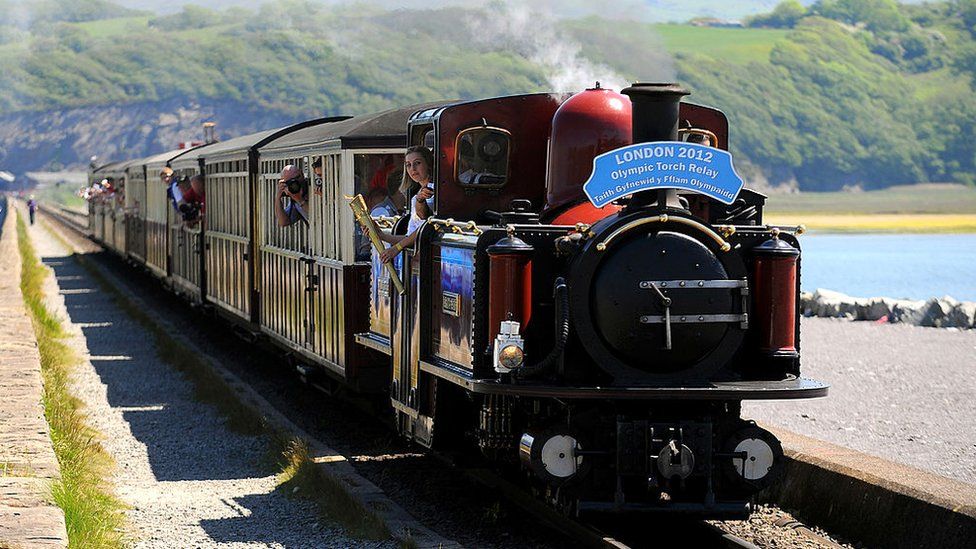Steam train on the Ffestiniog Railway carrying the Olympic torch