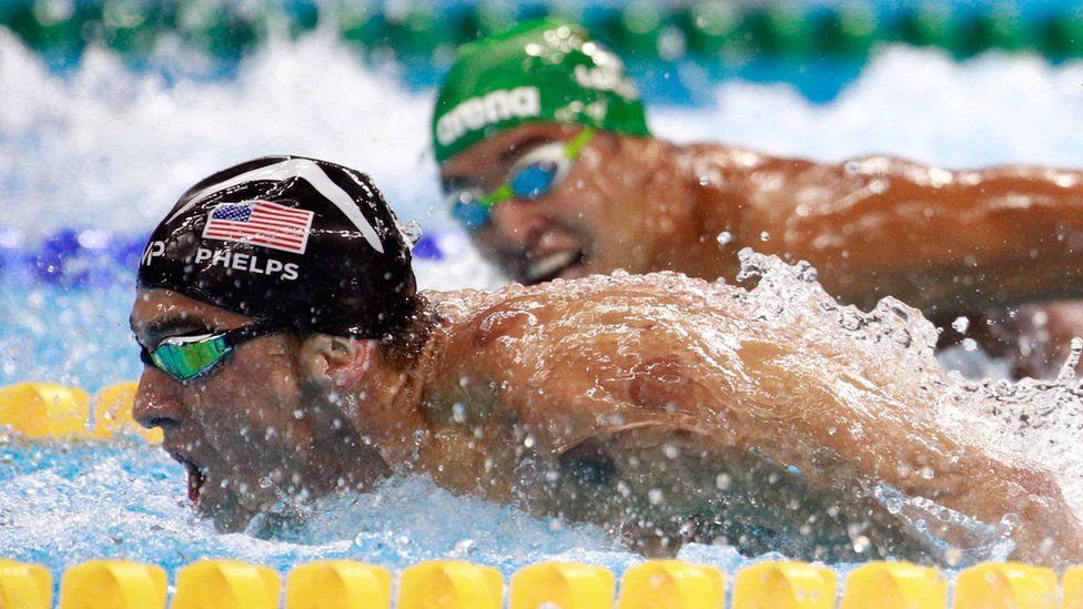 Michael Phelps leads Chad le Clos in the Men's 200m Butterfly Final