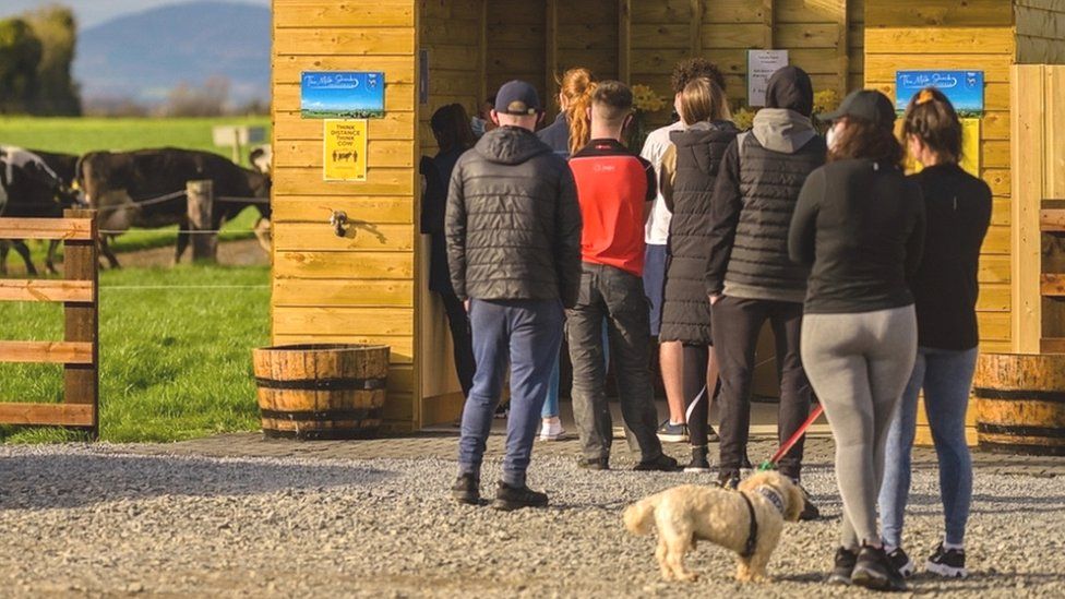 Queue outside Wholey Cow shed