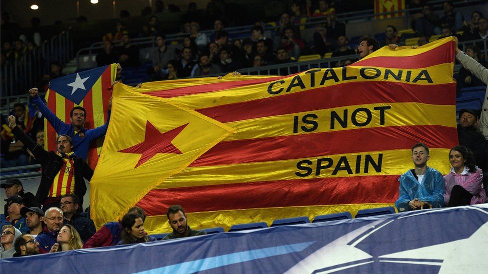 A Catalonia protest poster is shown during the UEFA Champions League group D match between FC Barcelona and Olympiakos Piraeus at Camp Nou on October 18, 2017 in Barcelona