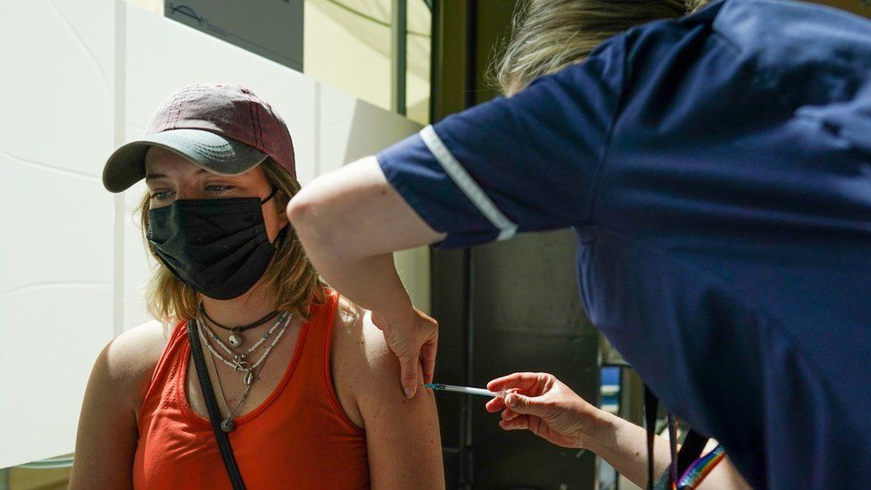 A woman gets vaccinated in Newcastle