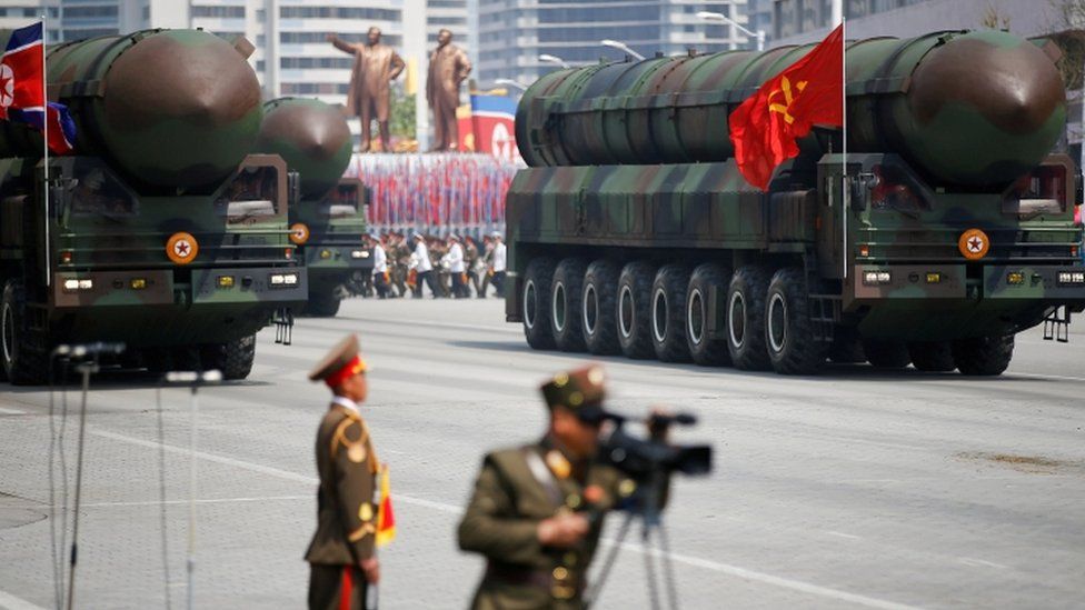 Trucks carrying ICBMs in North Korea