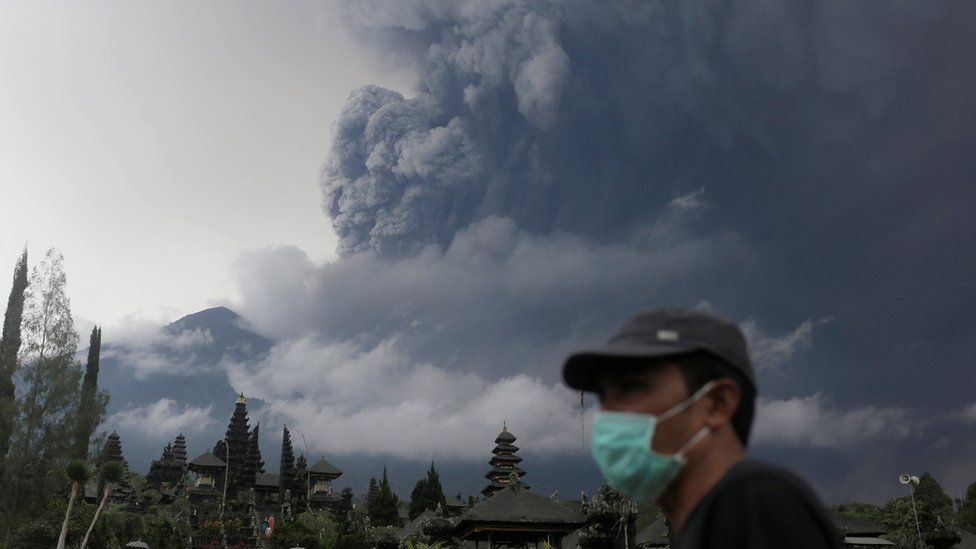 Mount Agung volcano erupts as seen from Besakih Temple in Karangasem, Bali