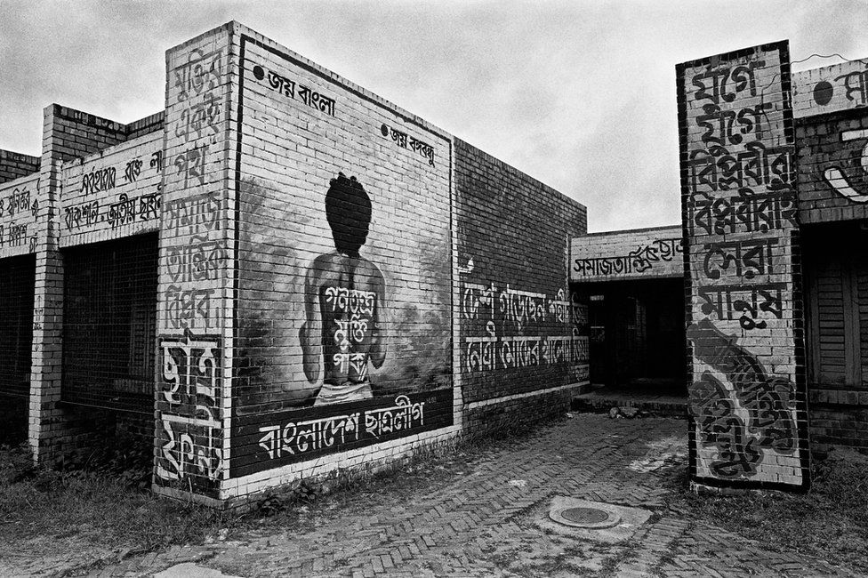 Murals on a wall at a university in Dhaka