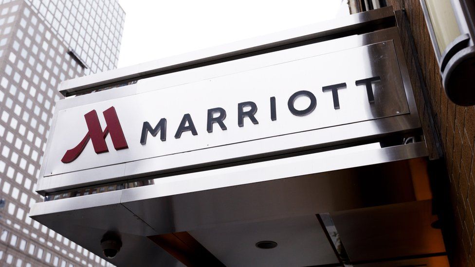 The Marriott hotel logo and name is seen on the steel awning of a Manhattan hotel