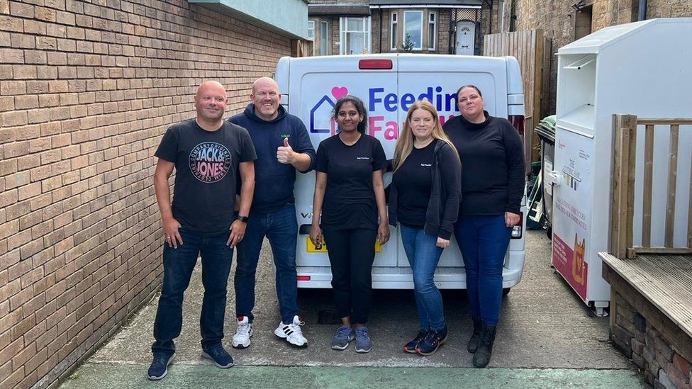 A radical  of volunteers extracurricular  a Feeding Families van