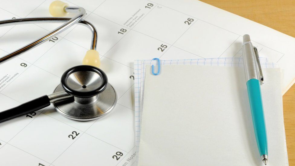 Stethoscope and calendar