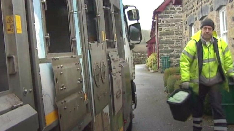 A refuse collector in Conwy county