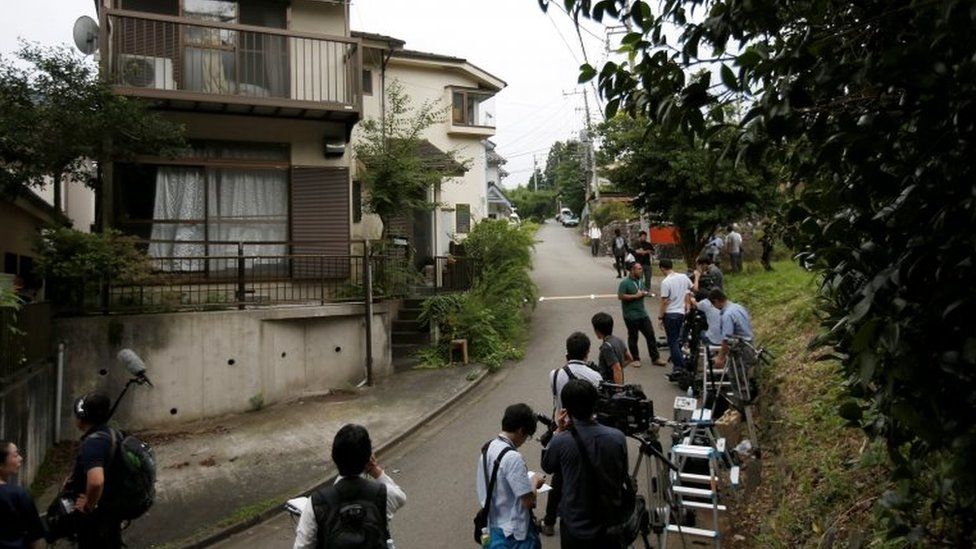 Reporters outside suspect's home in Sagamihara, Japan (26 July 2016)
