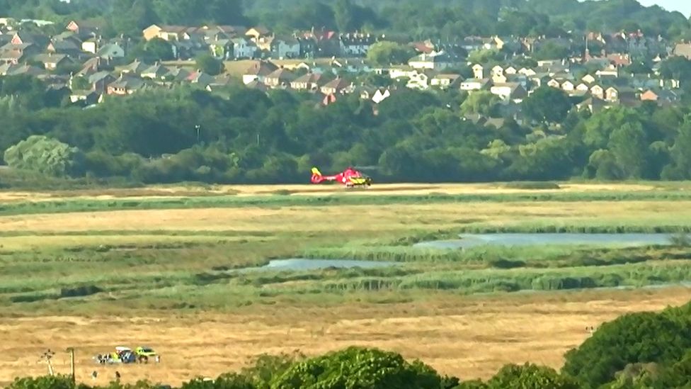 Air ambulance taking off.