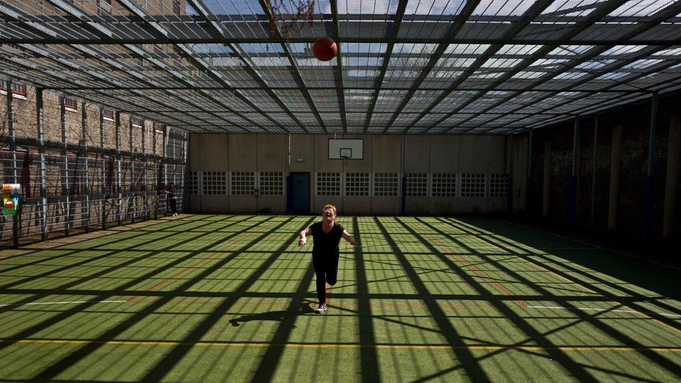 Mongolian migrant Naaran Baatar, 40, plays basketball