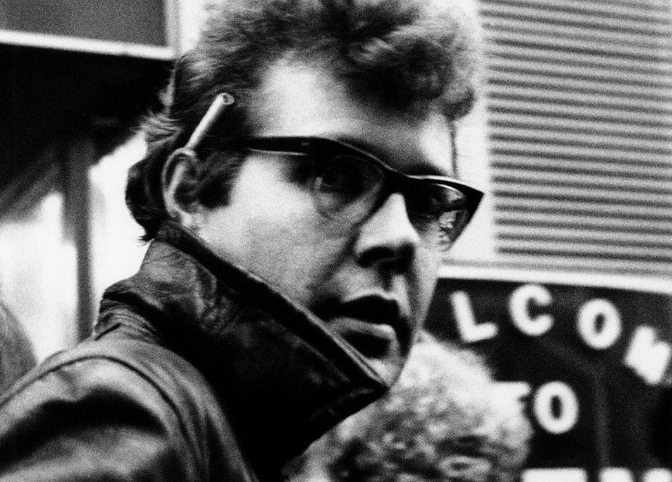 Johnny Green, road manager of The Clash outside Cinema Blue in Dean Street, Soho, London, 2 November 1978