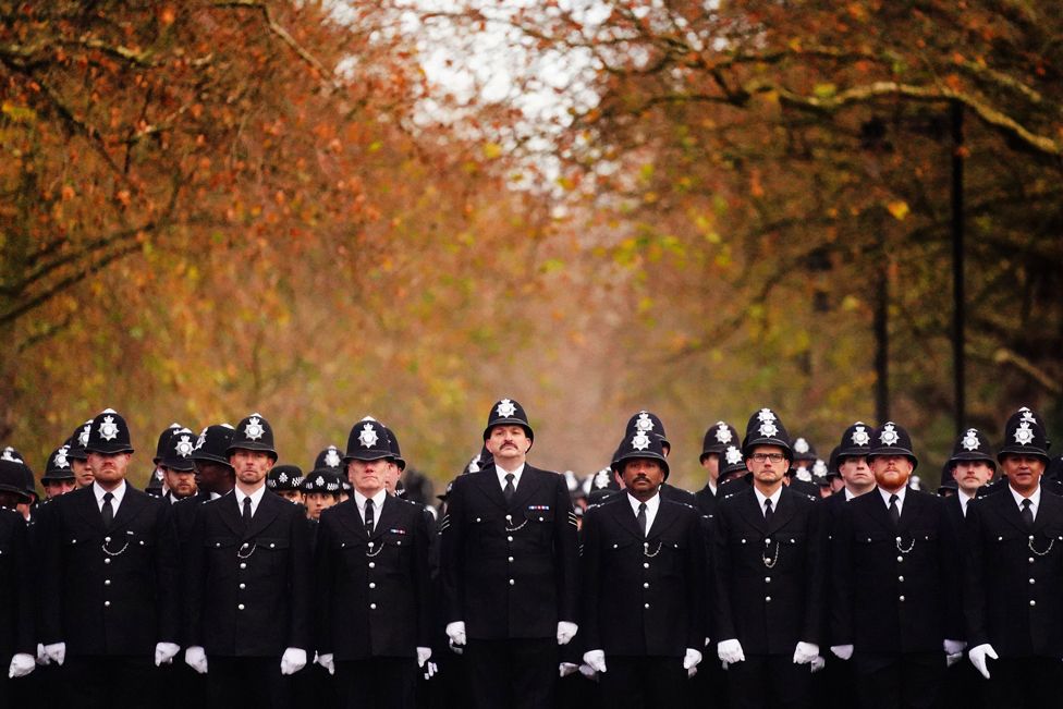 Police officers from the Metropolitan Police take part in a memorial service to remember and celebrate the life of Metropolitan Police Sergeant Matt Ratana at The Royal Military Chapel in Westminster on 29 November 2021, in London