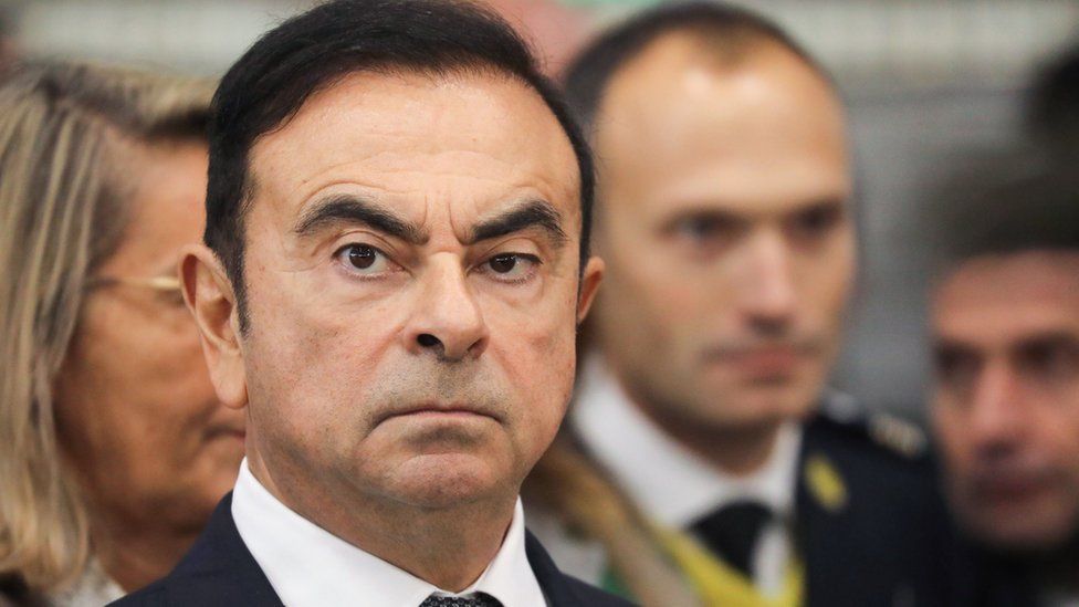 Chairman and CEO of Renault-Nissan-Mitsubishi Carlos Ghosn looks on during a visit of French President at the Renault factory, in Maubeuge, northern France, on November 8, 2018.