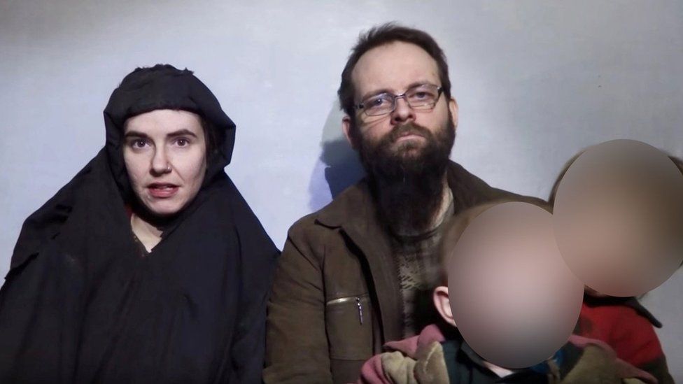 A still image from a video posted by Afghan insurgents on social media showing Caitlan Coleman, her Canadian husband Joshua Boyle and two boys
