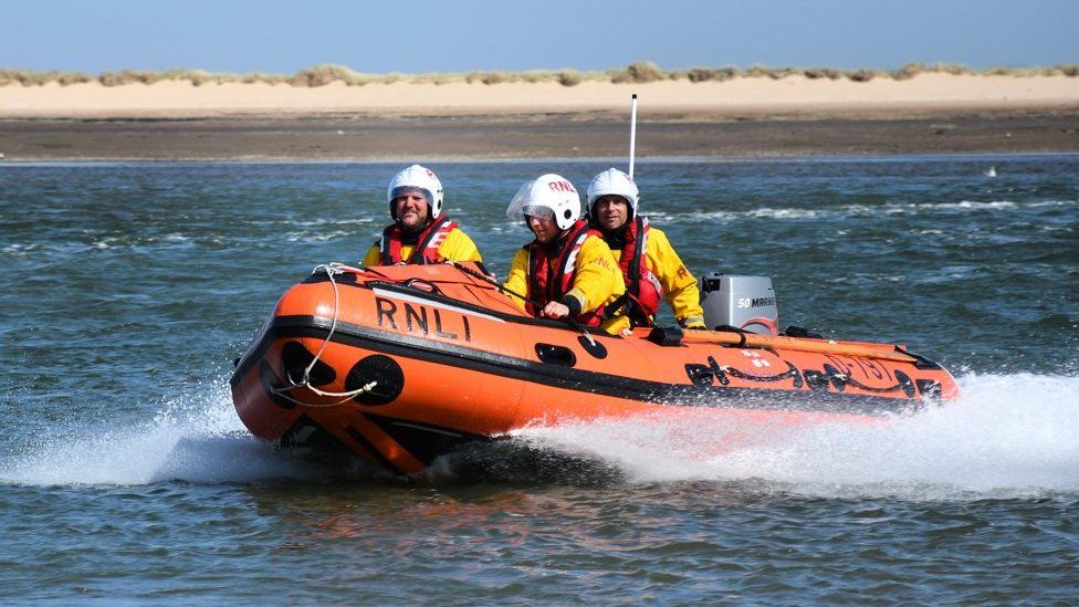 RNLI crew from Wells-next-the-Sea in a lifeboat