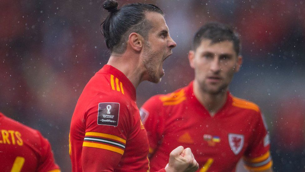 Gareth Bale roars with Ben Davies behind him as Wales qualify for World Cup 2022 after beating Ukraine