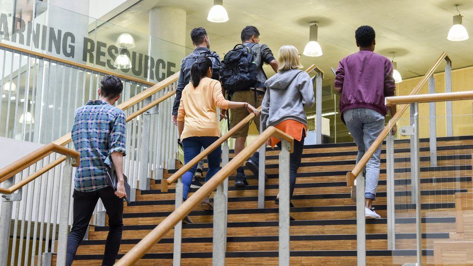 Students at a university building