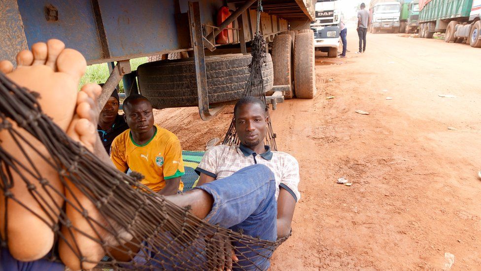 Drivers waiting to unload their cocoa in San Pedro