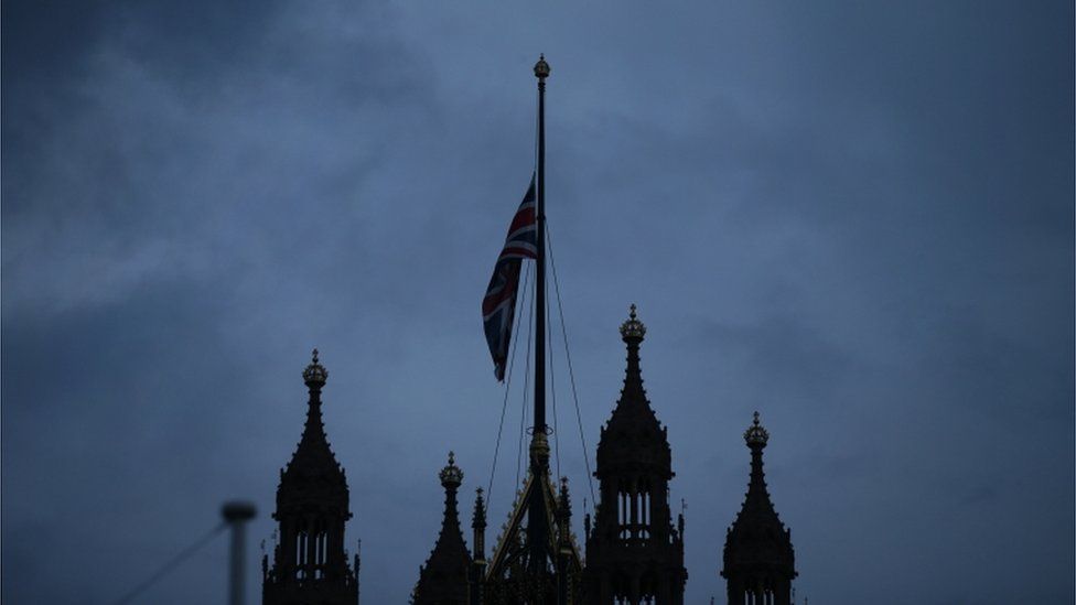 Flags lowered over Parliament